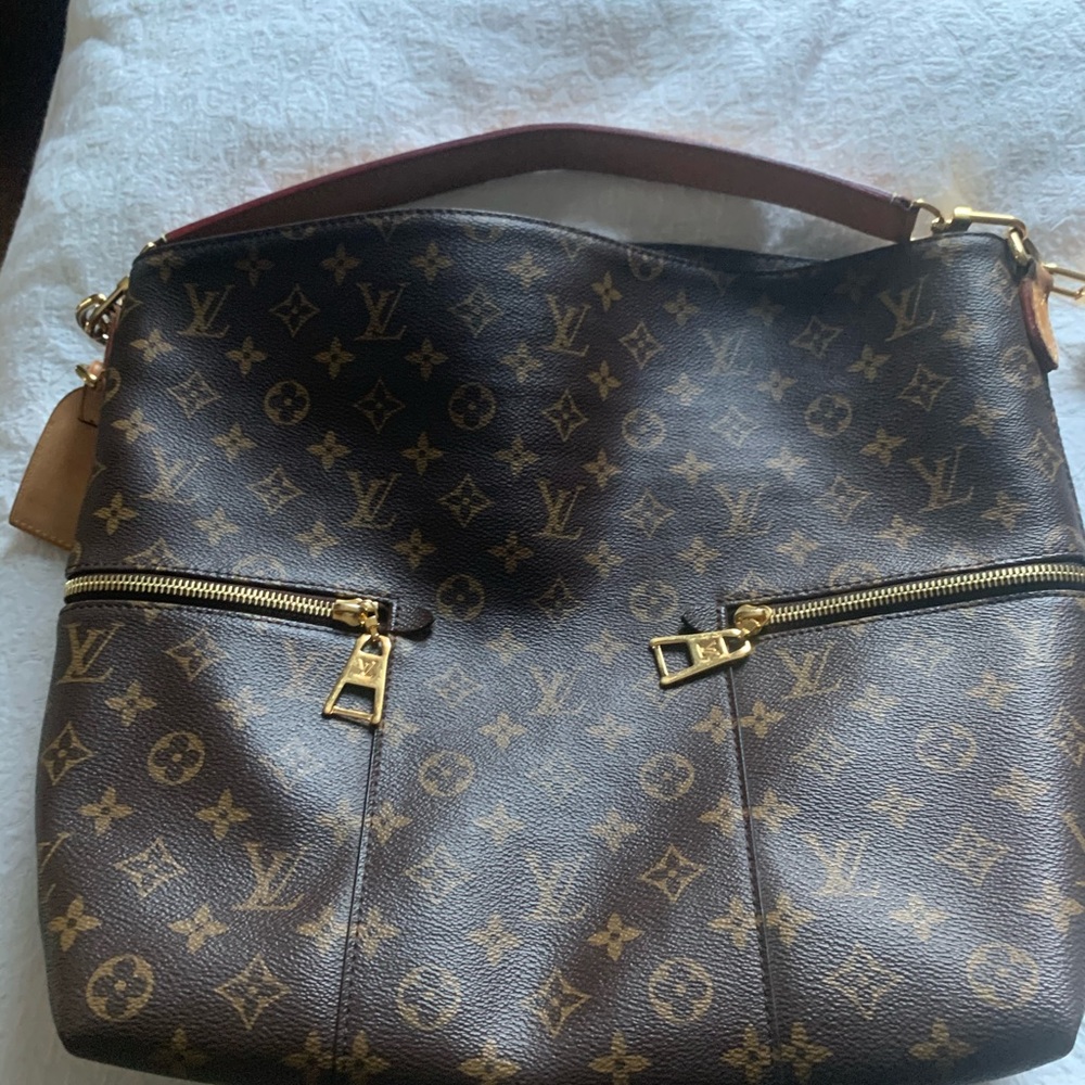 Louis Vuitton cross body satchel  bag